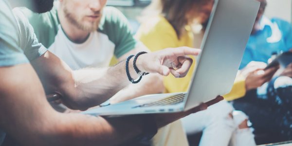 Closeup Group Modern Young Business People Gathered Together Discussing Creative Project.Coworkers Meeting Communication Discussion Working Office Startup Concept.Businessman Work Process Laptop