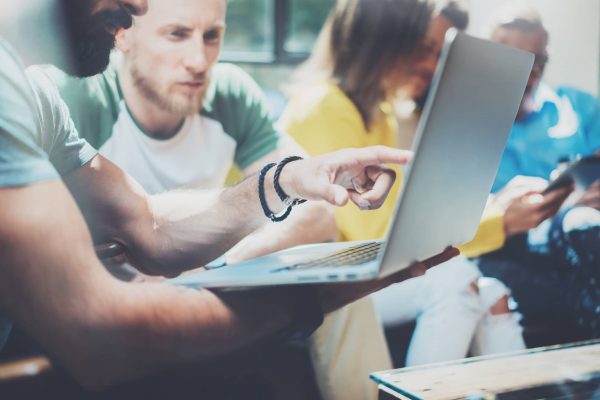 Closeup Group Modern Young Business People Gathered Together Discussing Creative Project.Coworkers Meeting Communication Discussion Working Office Startup Concept.Businessman Work Process Laptop